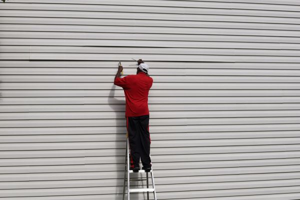 Loose Siding Repair in Rowlett