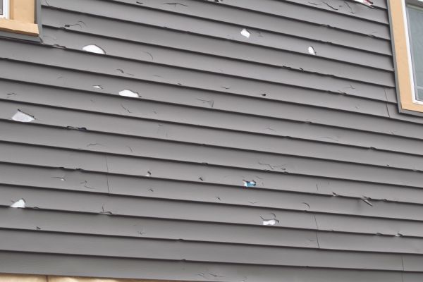 Damaged Siding Replacement in Rowlett